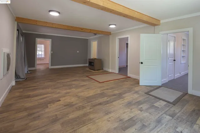 a view of a livingroom with wooden floor