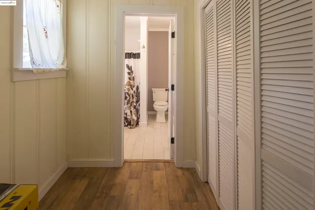 a view of a bathroom with a sink and a window
