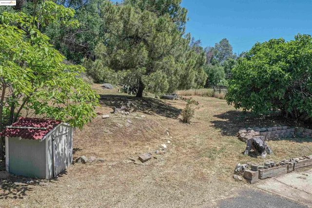 a view of a city with mountains in the background
