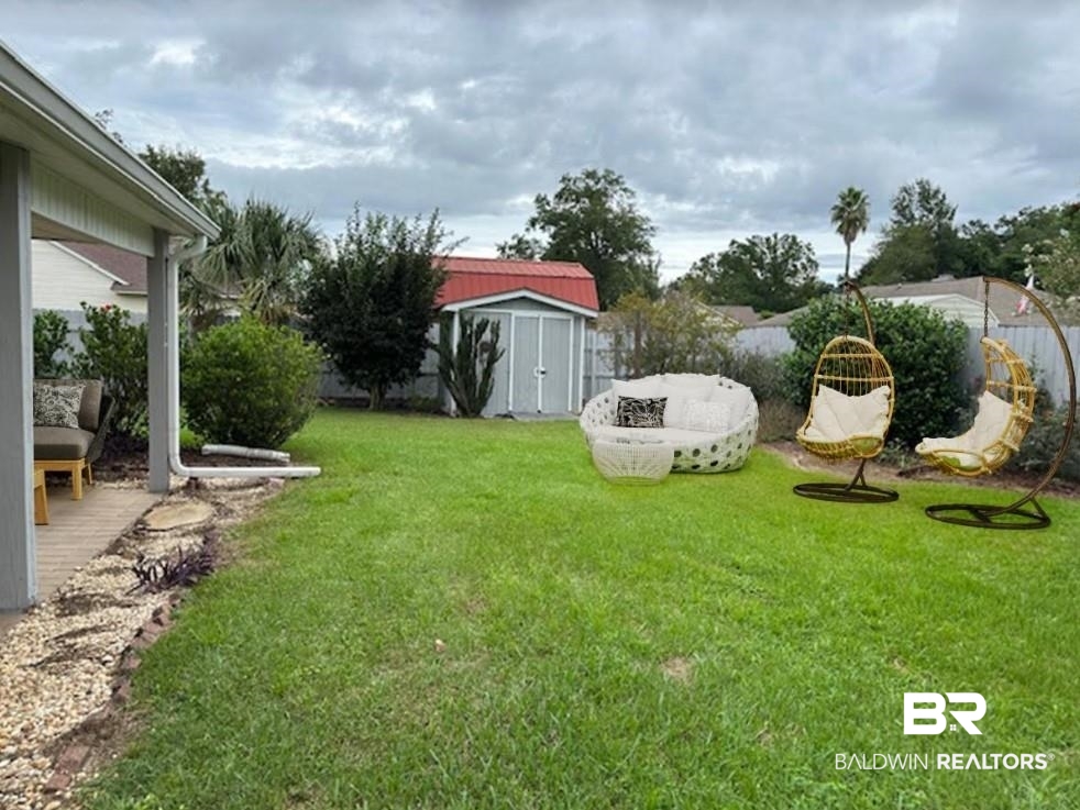 1512 North Cedar Street Foley, AL 36535 - Photo 11 of 13 View of yard with a shed