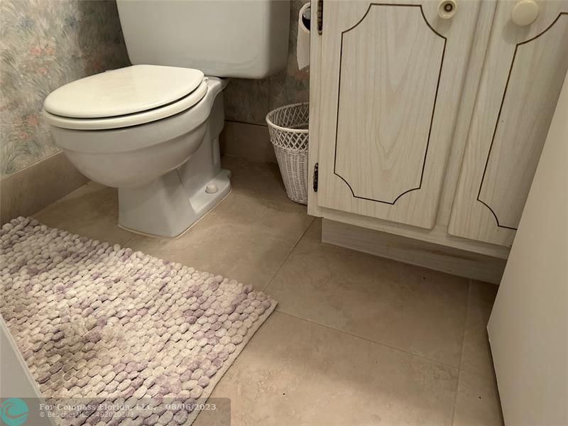 30 Tilford B, Unit 30 Deerfield Beach, FL 33442 - Photo 11 of 23 a bathroom with a toilet and a sink