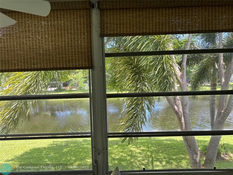 30 Tilford B, Unit 30 Deerfield Beach, FL 33442 - Photo 2 of 23 a view of outdoor space with swimming pool