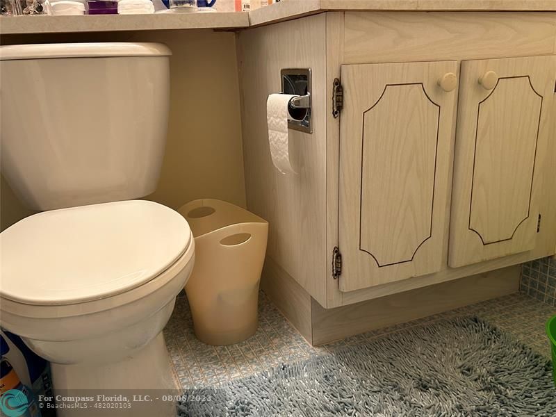 30 Tilford B, Unit 30 Deerfield Beach, FL 33442 - Photo 8 of 23 a bathroom with a toilet and a shower