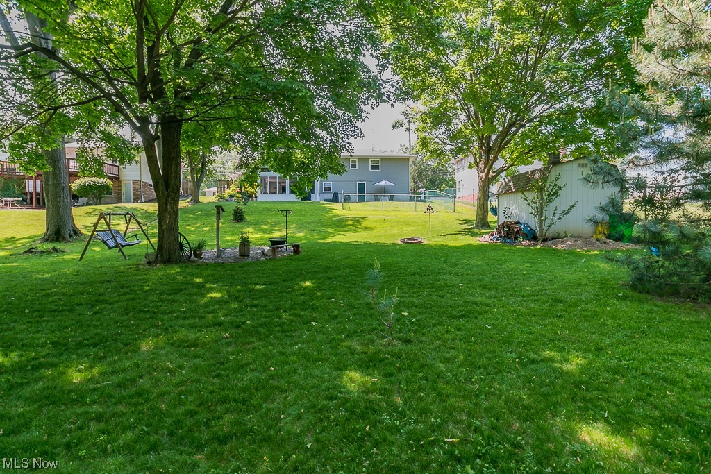 30073 Ridge Road Wickliffe, OH 44092 - Photo 34 of 34 Full view from property line back towards the home with view of Shed.