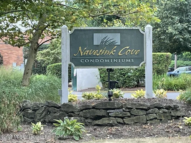 a sign on the side of the road