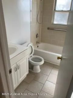 a bathroom with a toilet a sink and a bathtub
