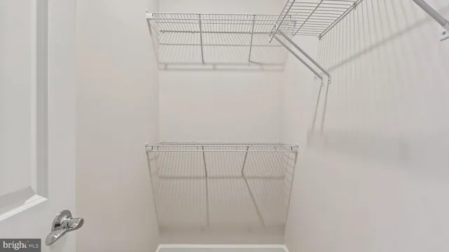 a view of small space with racks on the wall