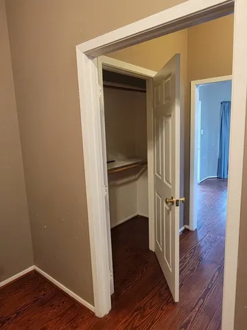 a view of kitchen and wooden floor