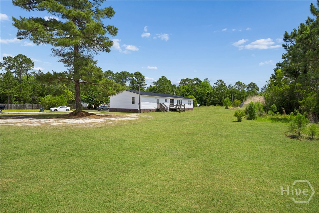 196 Tupelo Loop Ludowici, GA 31316 - Photo 28 of 34 **Grass Virtually enhanced