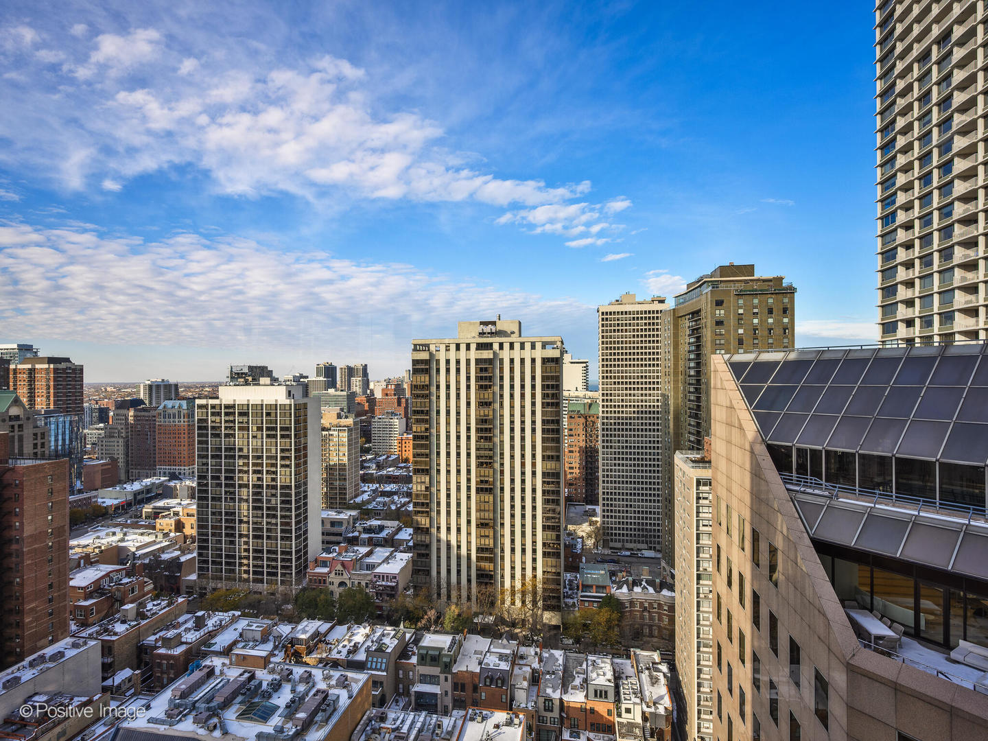 100 East Walton Street, Unit 32B Chicago, IL 60611 - Photo 14 of 17 a view of a city with tall buildings