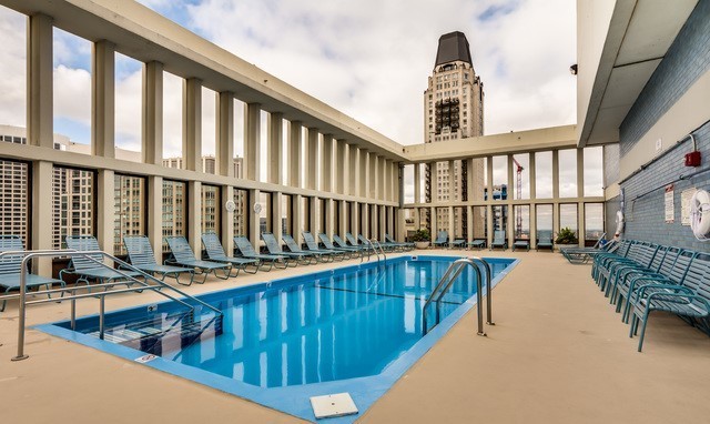 100 East Walton Street, Unit 32B Chicago, IL 60611 - Photo 15 of 17 a view of swimming pool with outdoor seating