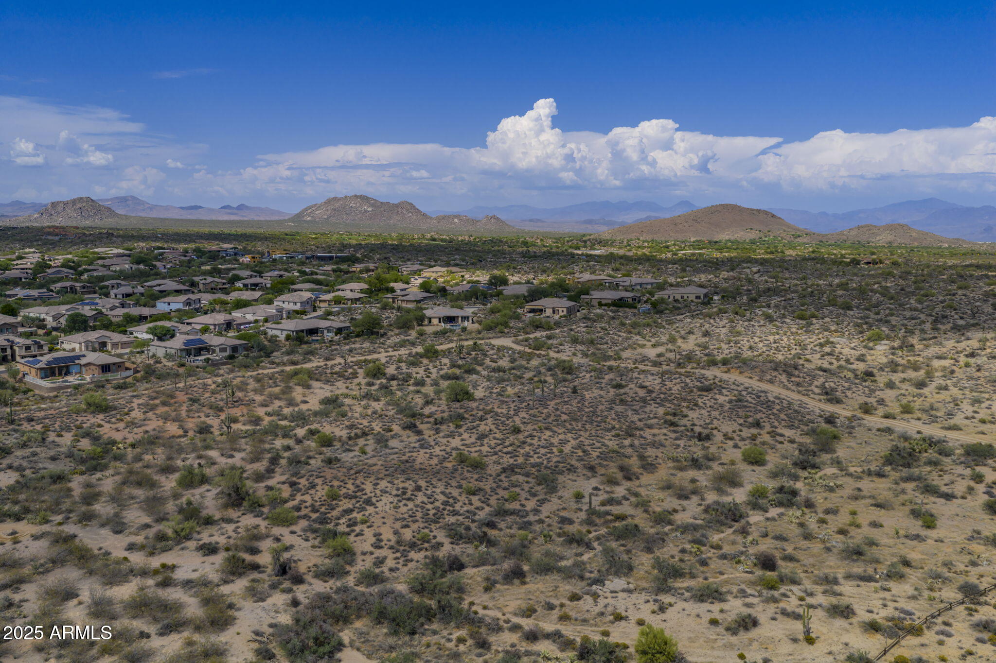 11473 East Oberlin Way, Unit 20 Scottsdale, AZ 85262 - Photo 19 of 29 a view of a of a building in middle of the town