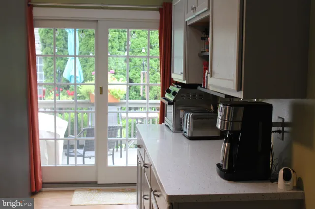 a kitchen with a window a sink and a window