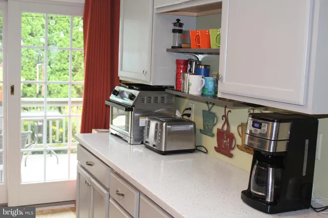 a room with furniture and a window