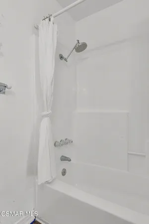 a view of room with walk in closet