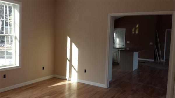 11 Griggs Road Sutton, MA 01590 - Photo 8 of 23 an empty room with wooden floor and a window