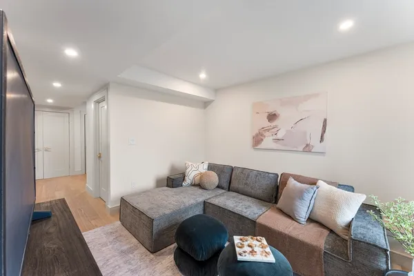 a living room with furniture and a couch
