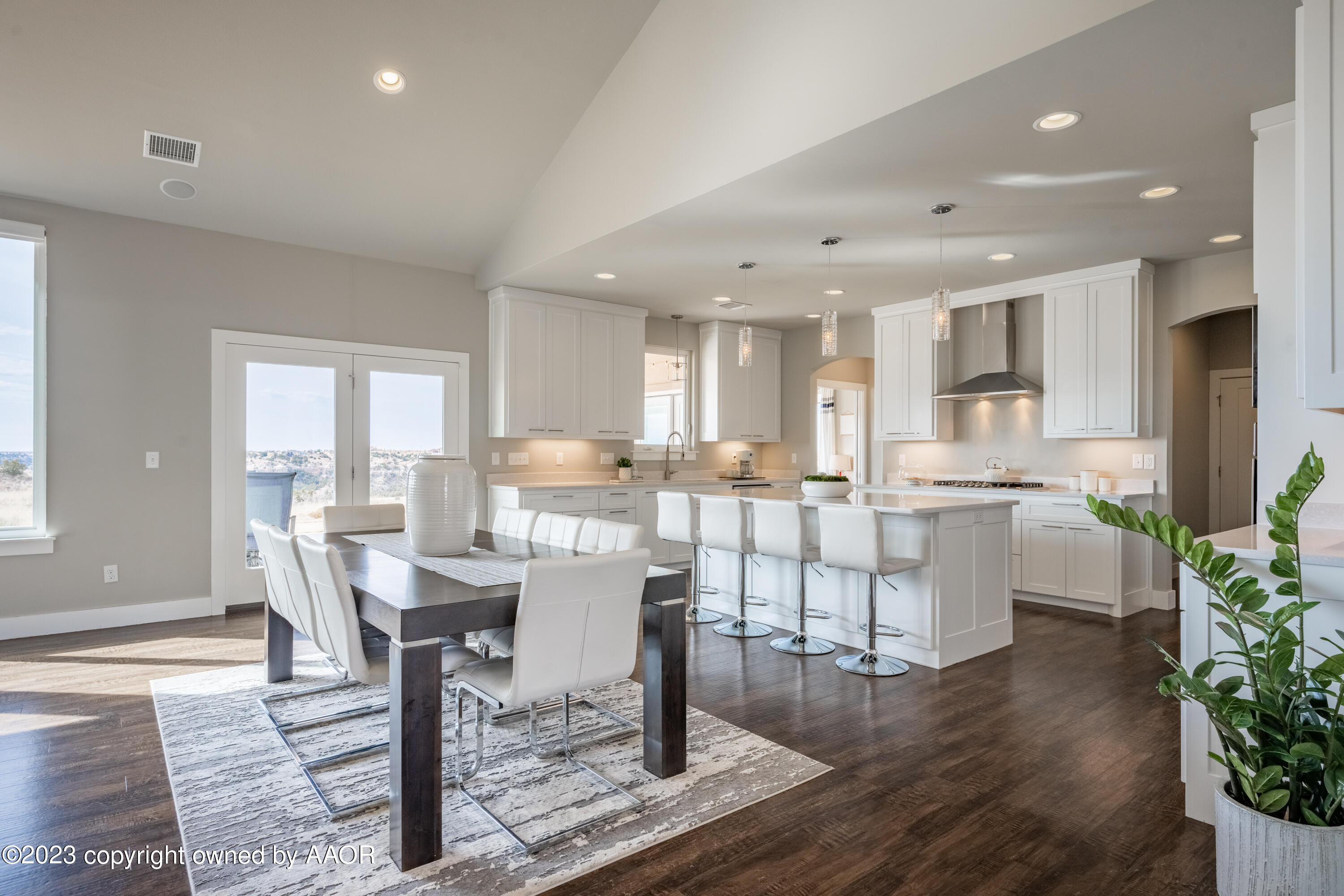15300 Canyon Pass Road Amarillo, TX 79118 - Photo 11 of 51 a view of a dining room with furniture window and wooden floor