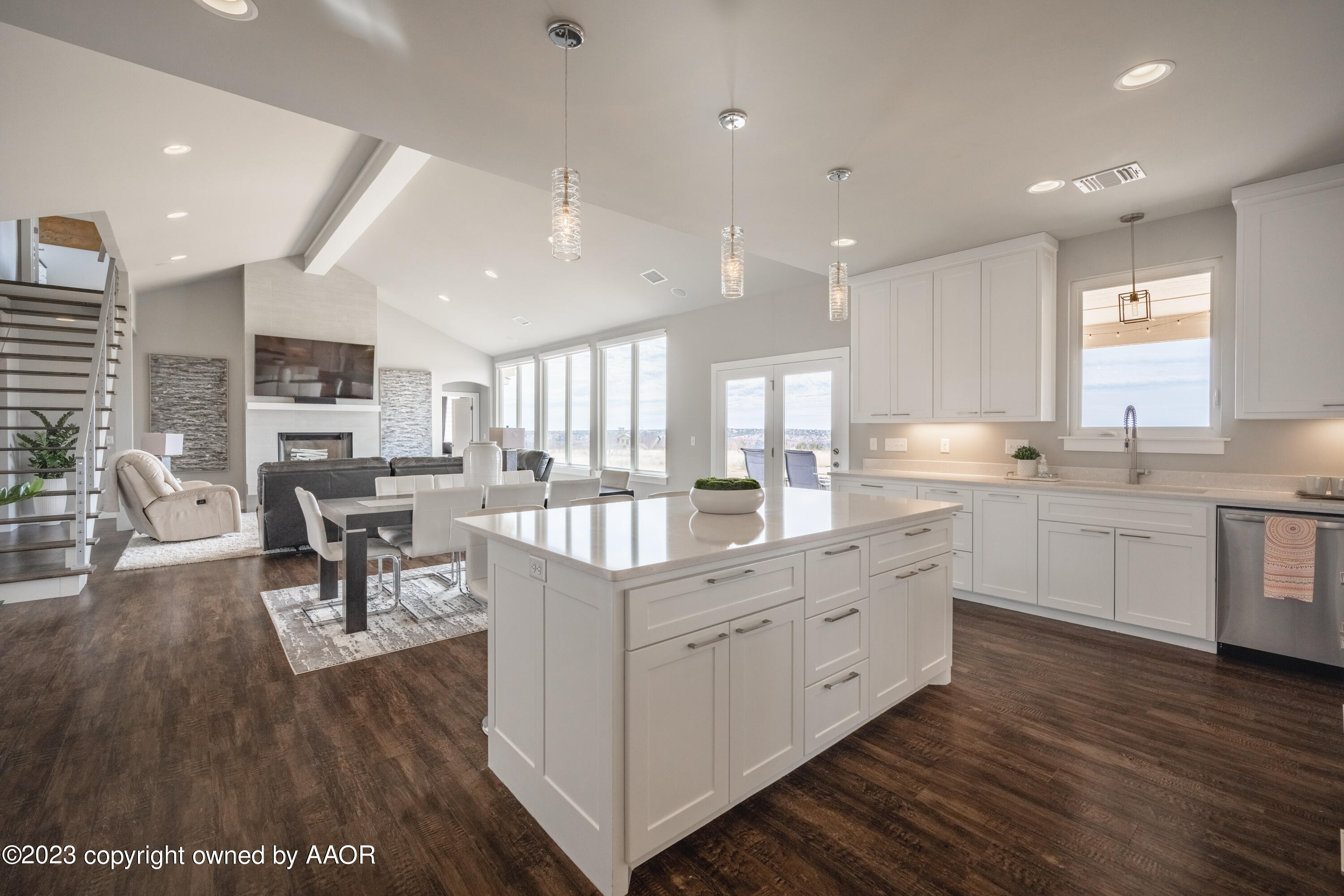 15300 Canyon Pass Road Amarillo, TX 79118 - Photo 15 of 51 a large kitchen with stainless steel appliances granite countertop a lot of counter space and a wooden floor