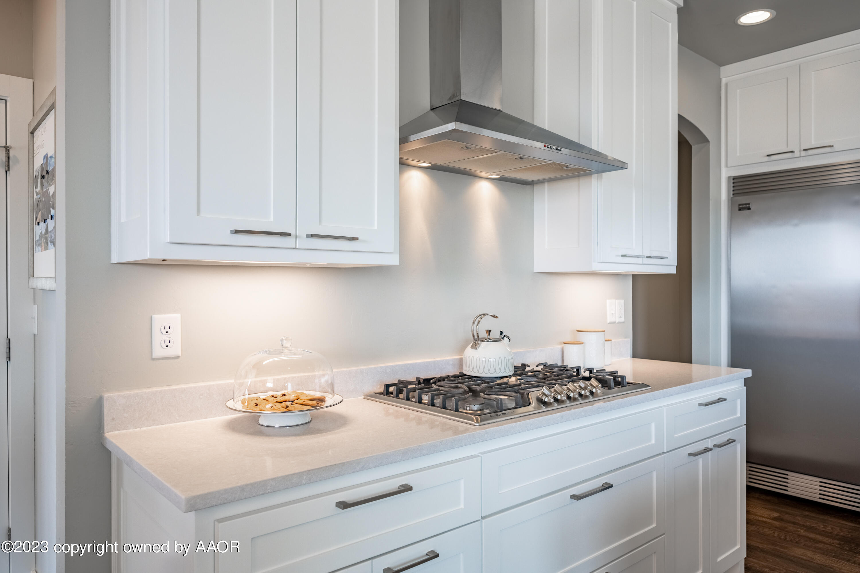 15300 Canyon Pass Road Amarillo, TX 79118 - Photo 18 of 51 a kitchen with a sink a stove and cabinets