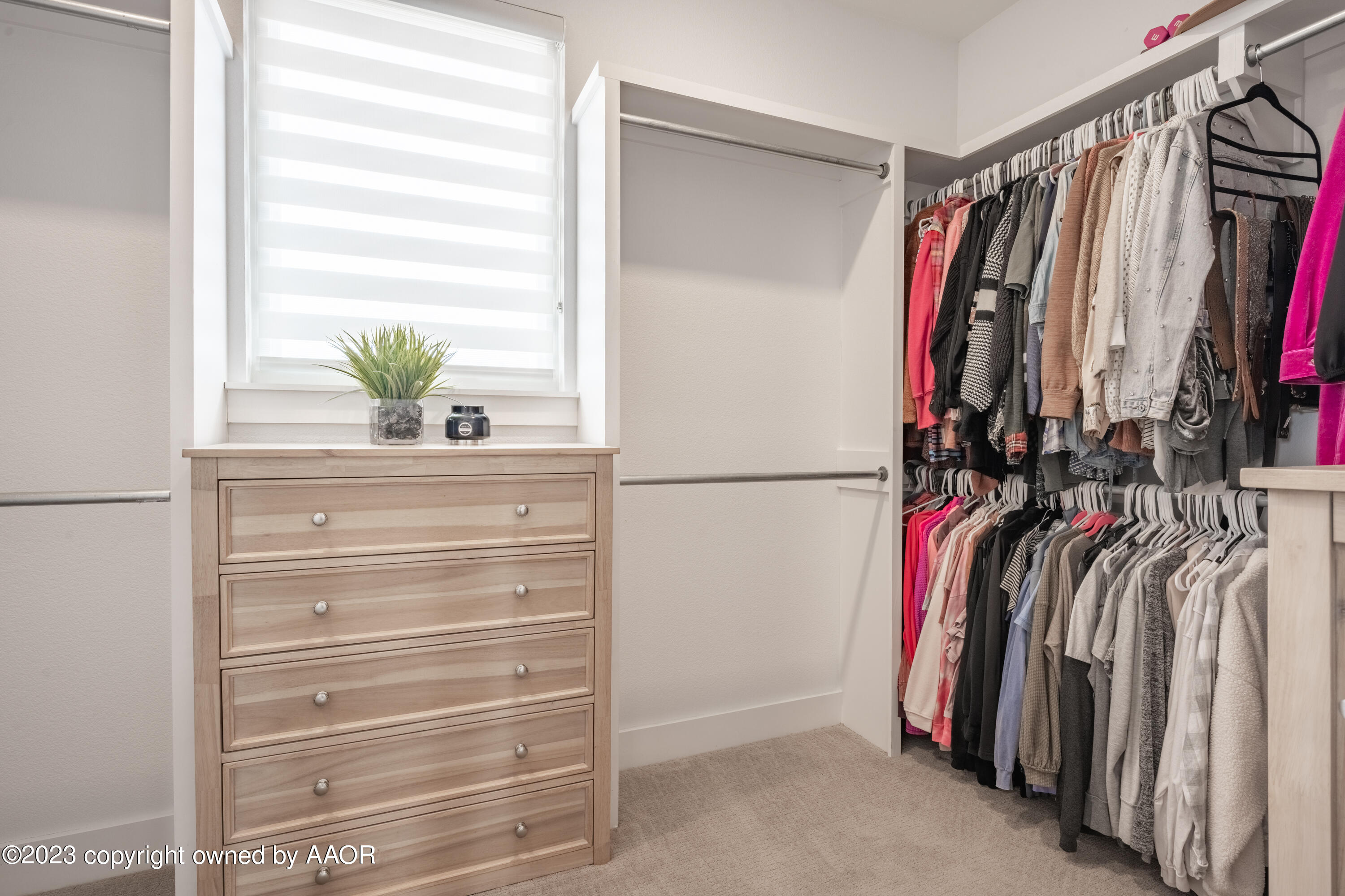 15300 Canyon Pass Road Amarillo, TX 79118 - Photo 26 of 51 a view of walk in closet with clothes and shoes