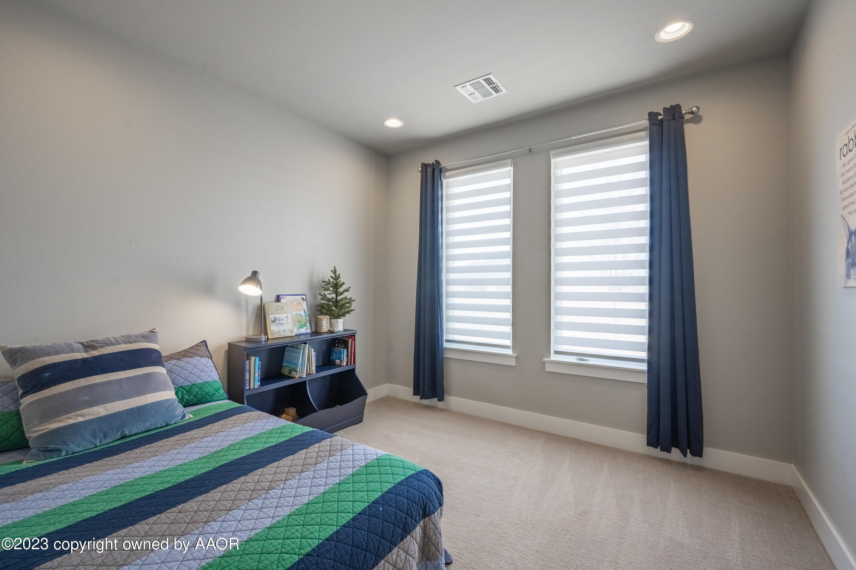 15300 Canyon Pass Road Amarillo, TX 79118 - Photo 27 of 51 a bedroom with a bed and a window