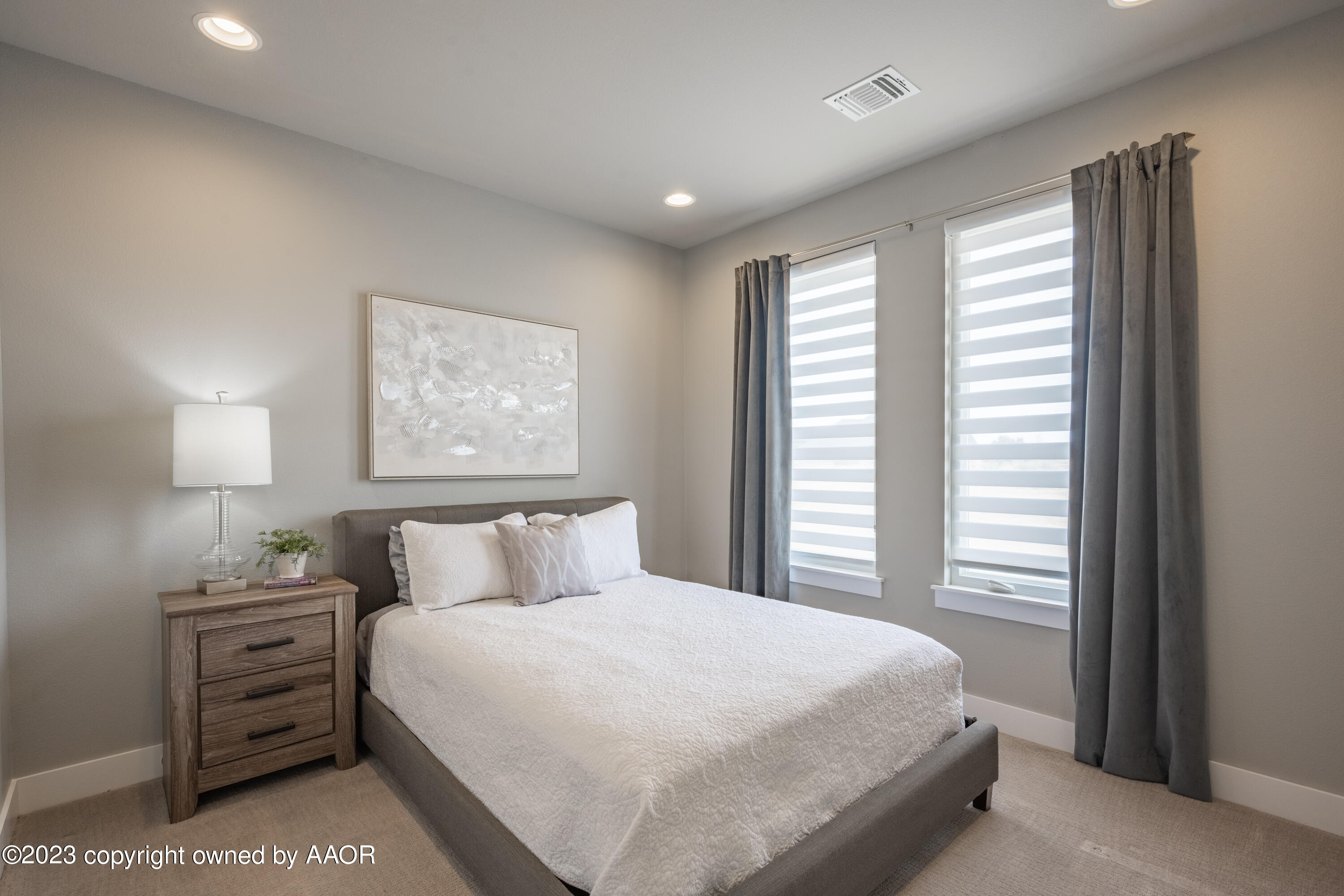 15300 Canyon Pass Road Amarillo, TX 79118 - Photo 32 of 51 a bedroom with a bed and a window