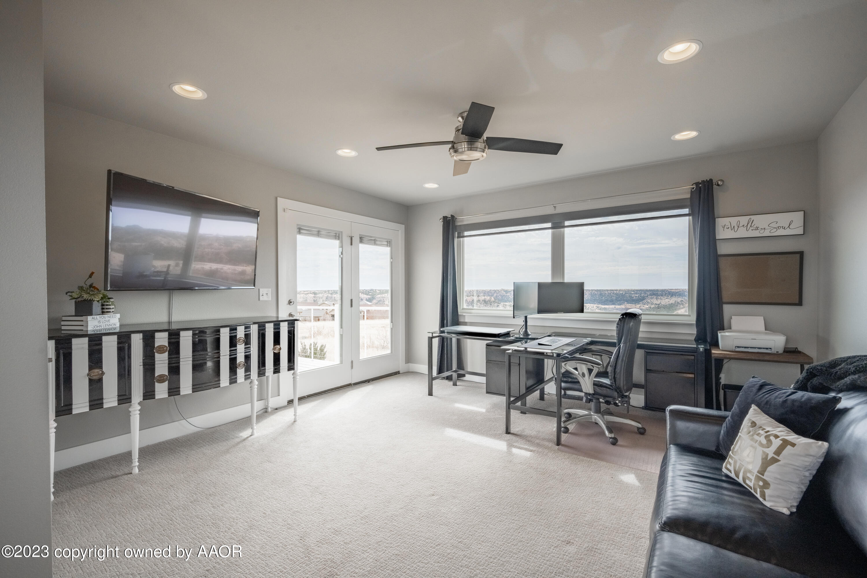 15300 Canyon Pass Road Amarillo, TX 79118 - Photo 36 of 51 a living room with furniture and a large window