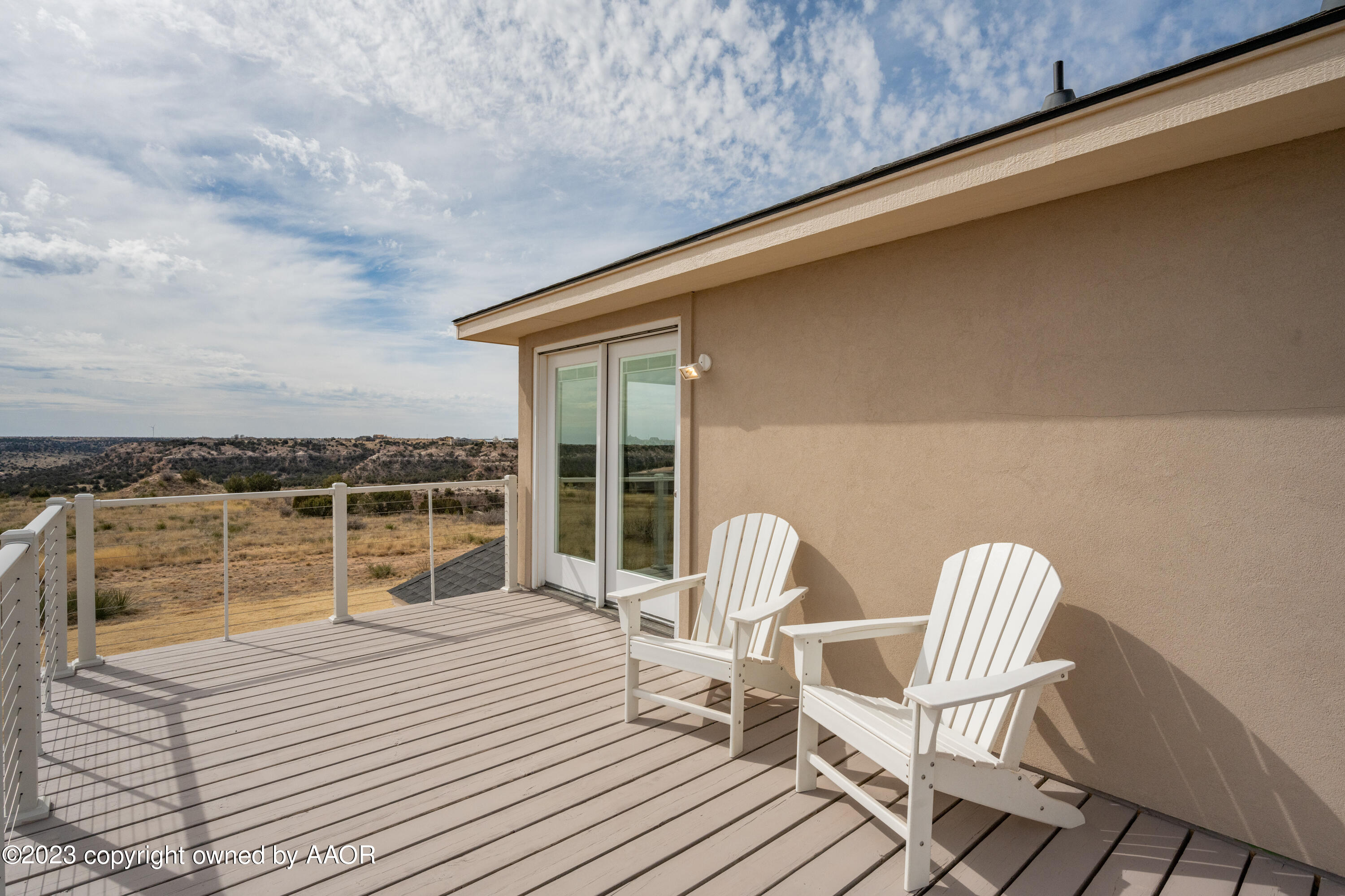 15300 Canyon Pass Road Amarillo, TX 79118 - Photo 39 of 51 a roof deck view with chair and table