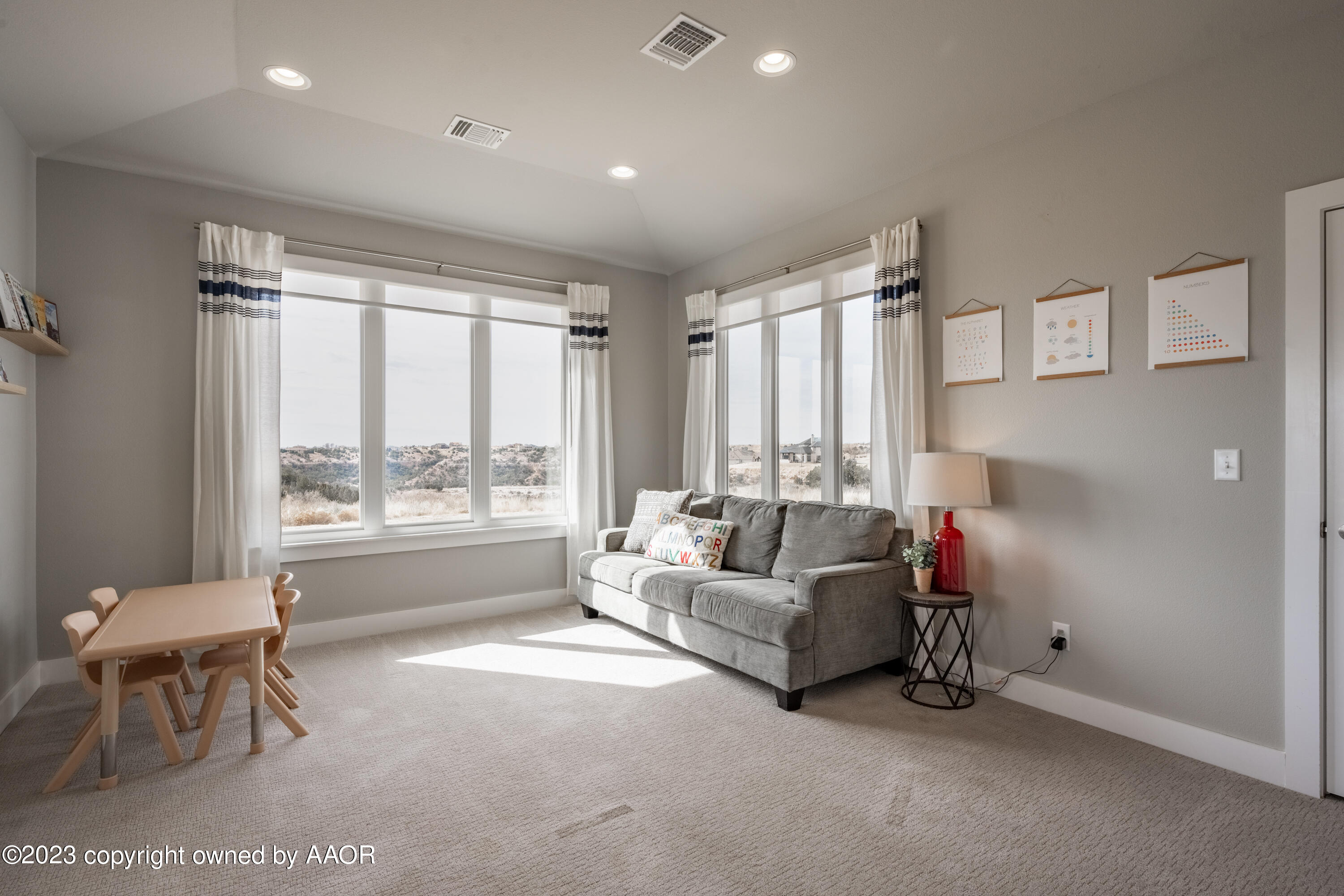 15300 Canyon Pass Road Amarillo, TX 79118 - Photo 40 of 51 a living room with furniture and a large window