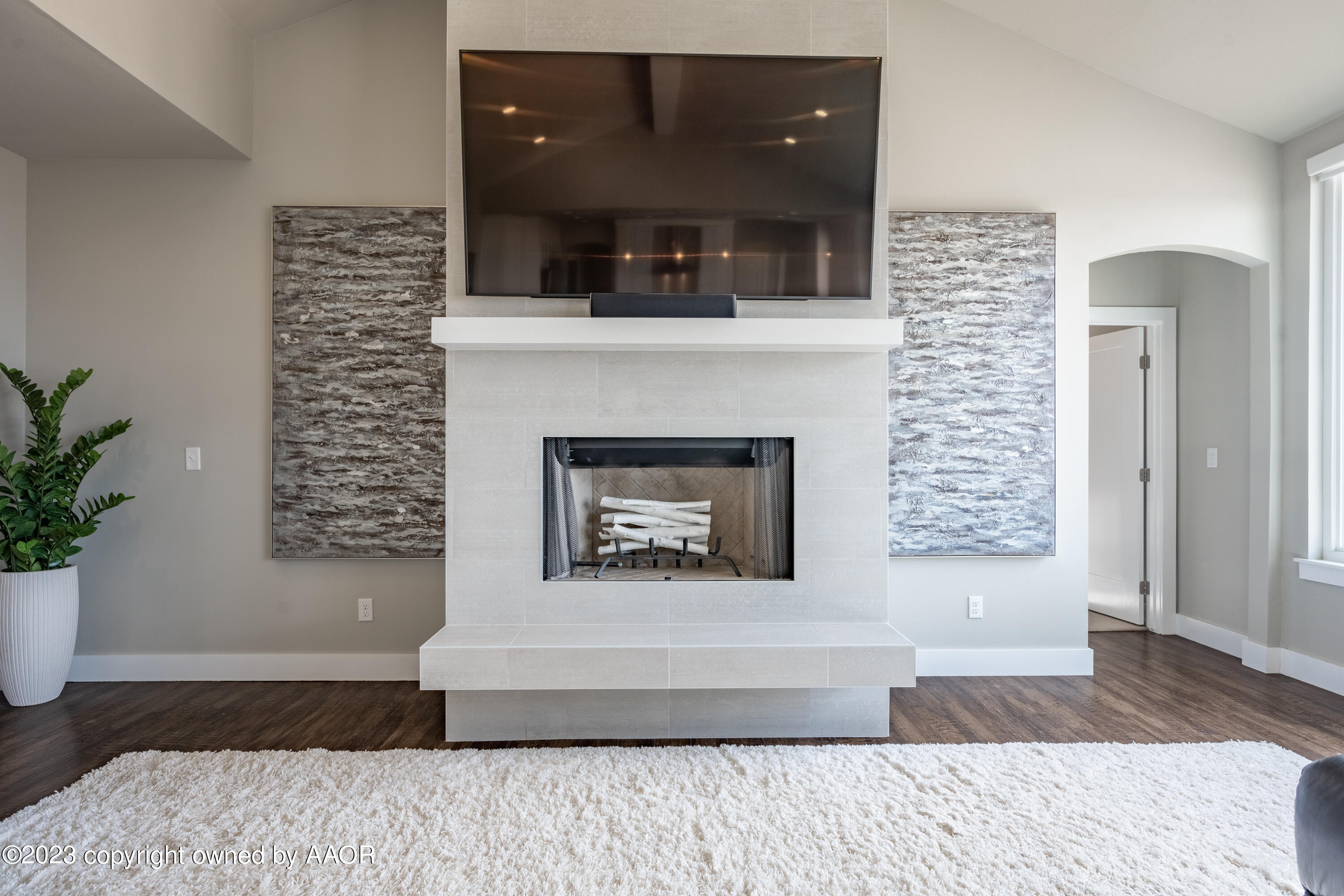 15300 Canyon Pass Road Amarillo, TX 79118 - Photo 6 of 51 a living room with a couch and a fireplace