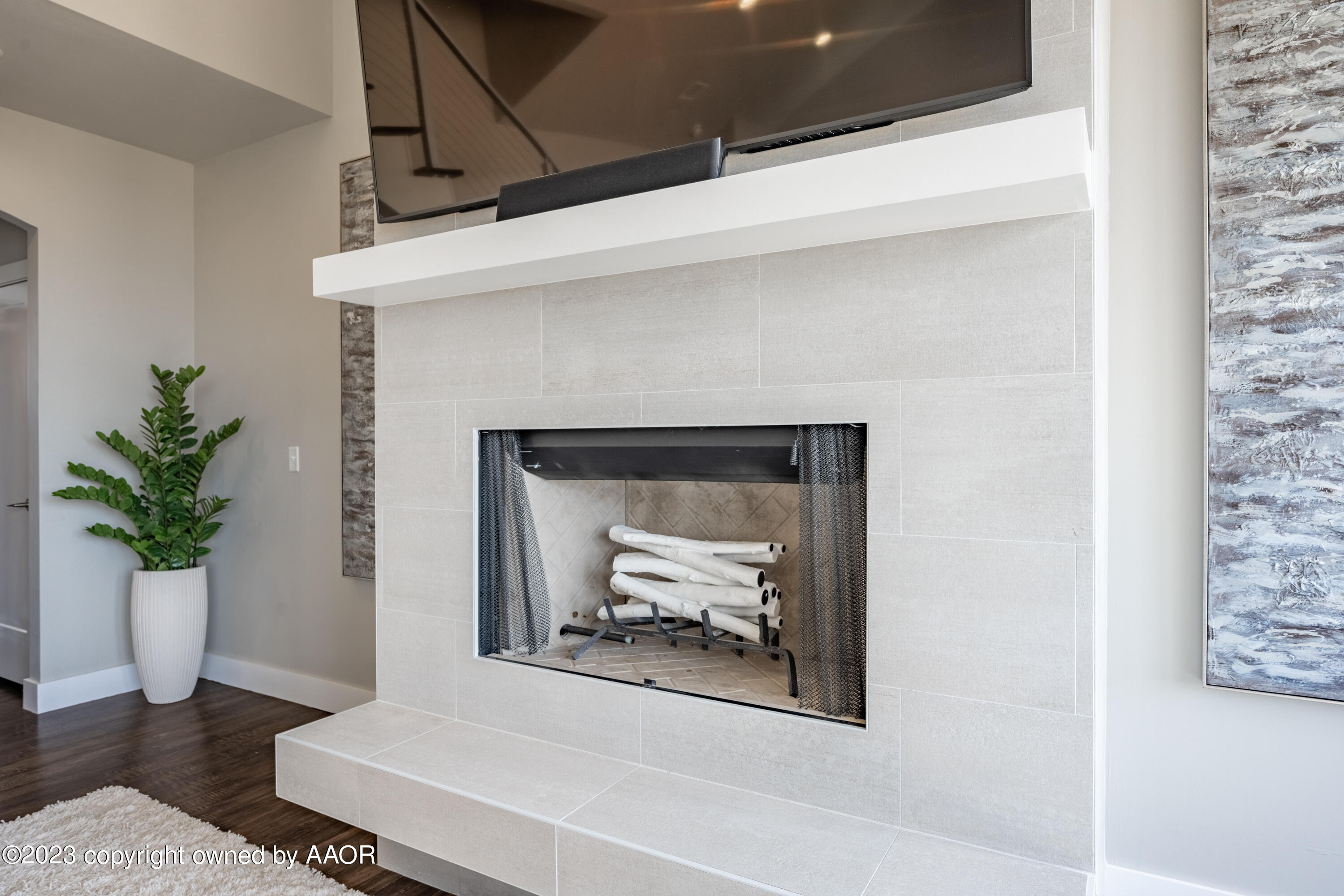 15300 Canyon Pass Road Amarillo, TX 79118 - Photo 7 of 51 a living room with furniture and a fireplace