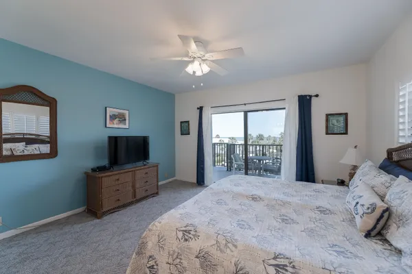a view of a balcony with chairs