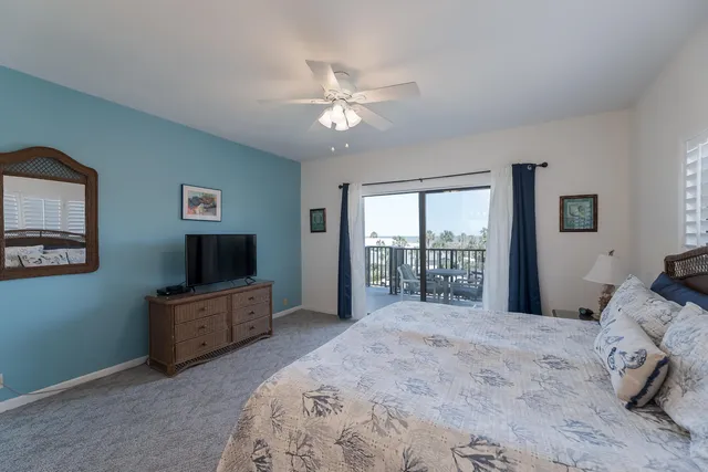 a view of a balcony with chairs