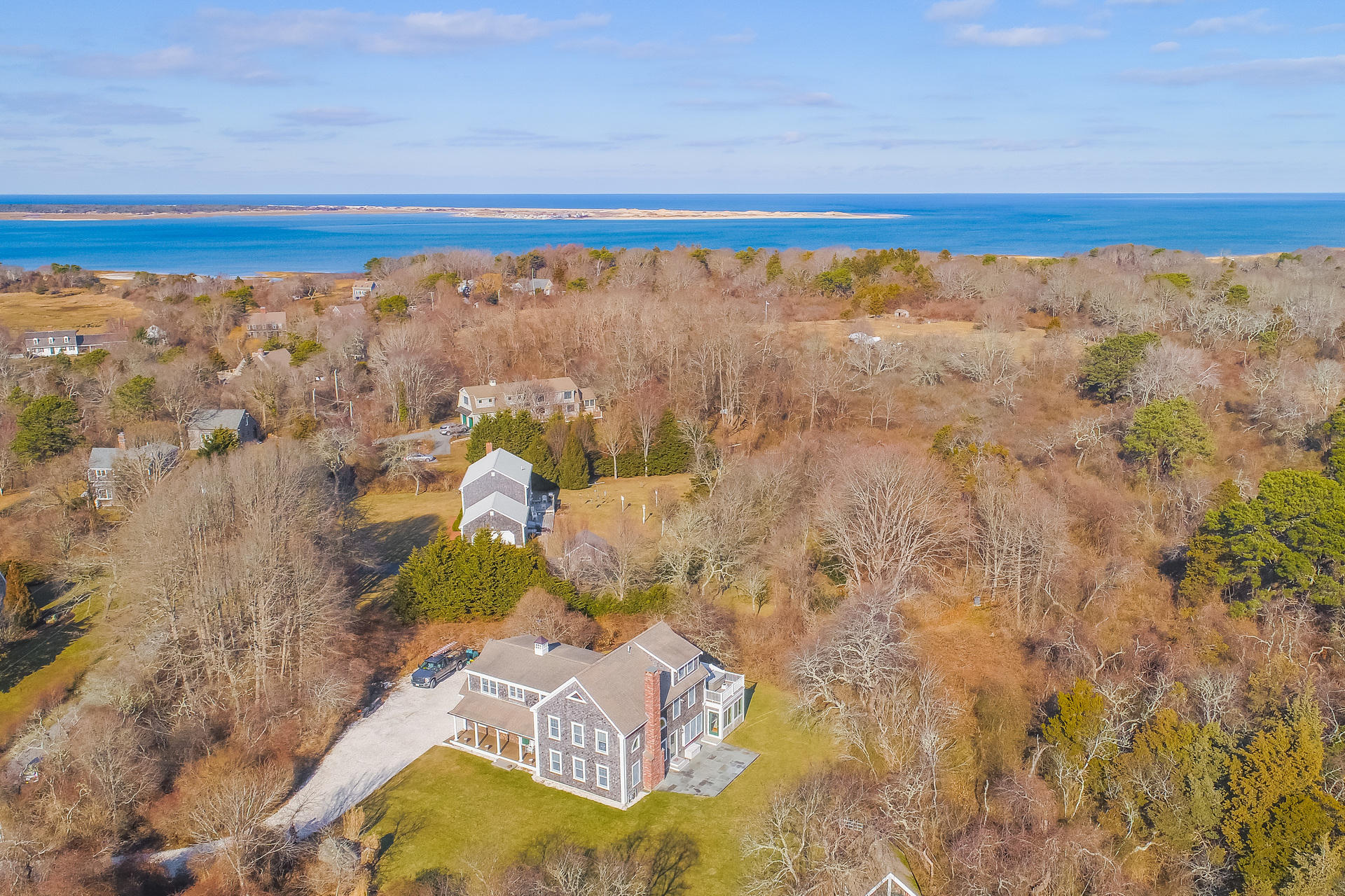 a bathroom with a blue wall and a shower