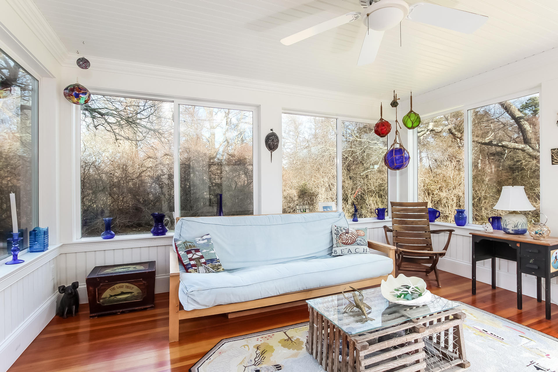 79 Stoney Point Road Cummaquid, MA 02675 - Photo 11 of 34 a living room with furniture and a large window