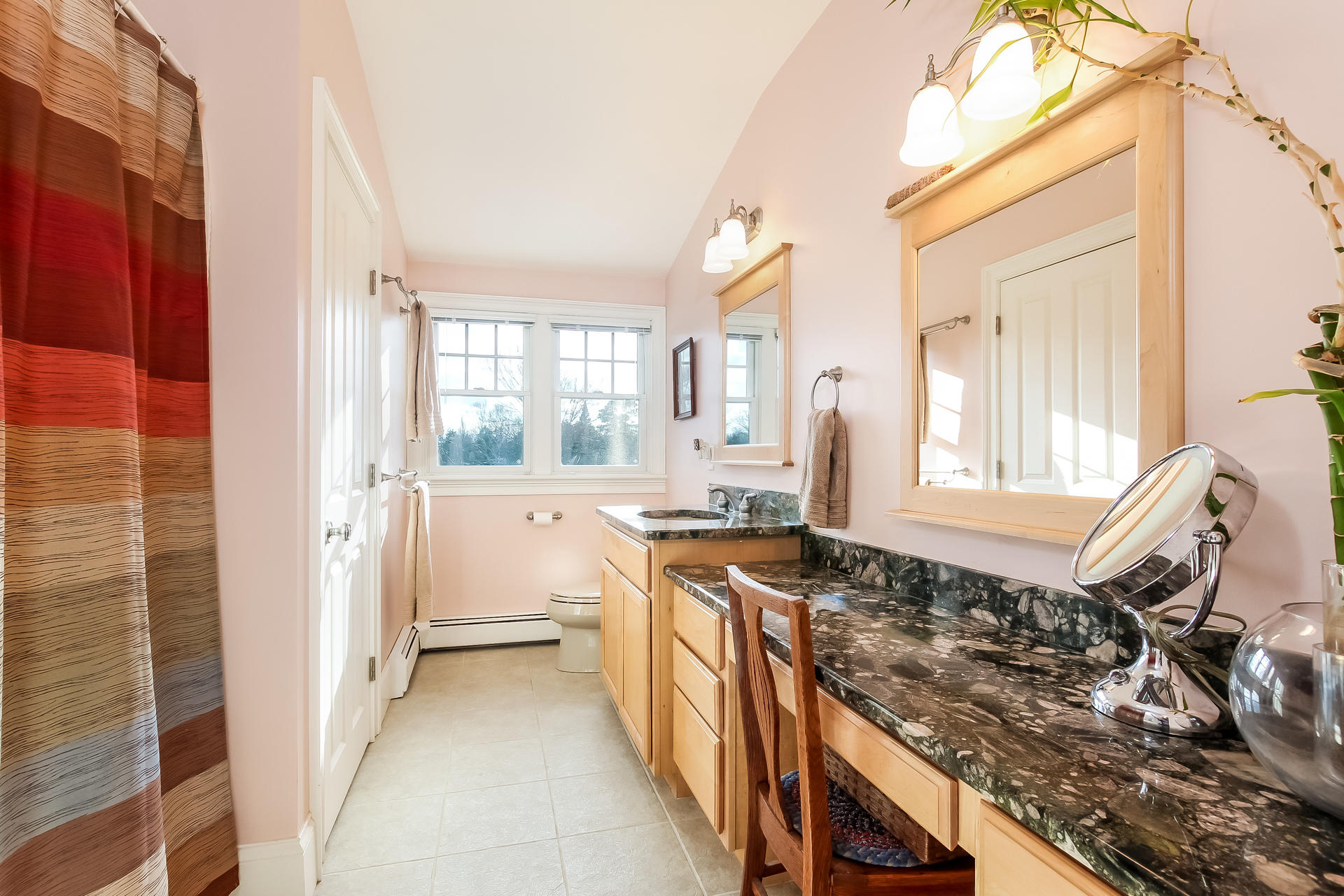 79 Stoney Point Road Cummaquid, MA 02675 - Photo 17 of 34 a view of a kitchen with a sink and dishwasher a stove top oven with wooden floor