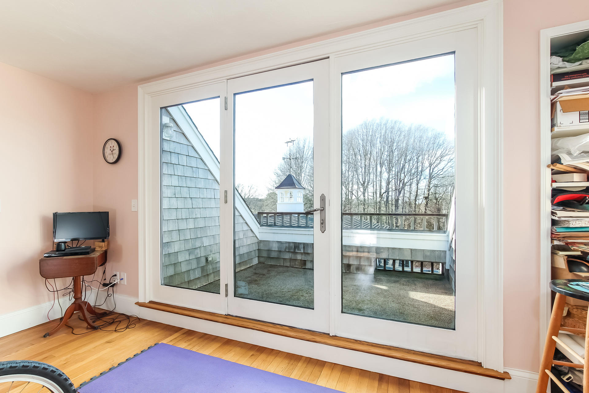 79 Stoney Point Road Cummaquid, MA 02675 - Photo 24 of 34 a living room with furniture and a floor to ceiling window