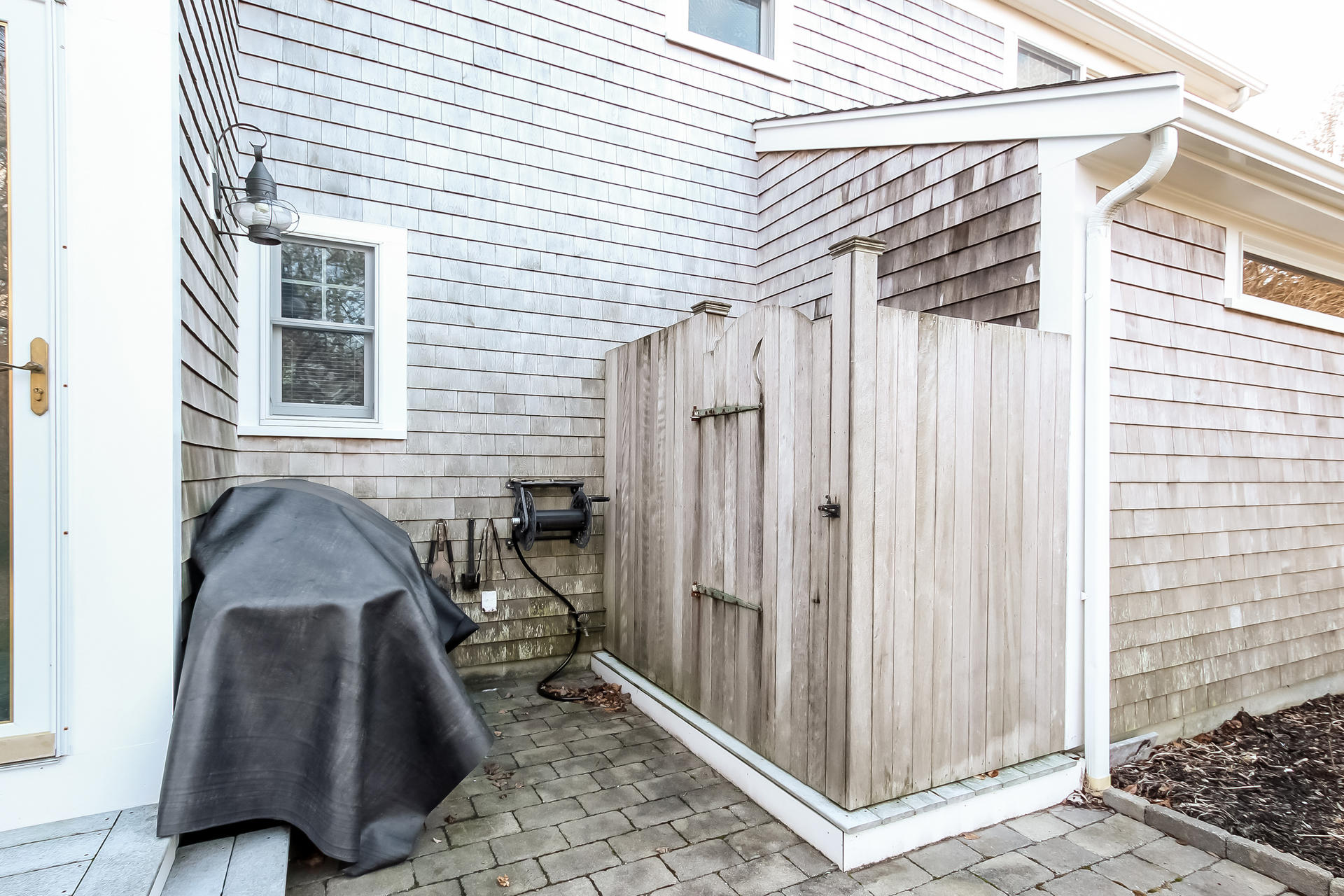 79 Stoney Point Road Cummaquid, MA 02675 - Photo 27 of 34 a view of a house with backyard and sitting area