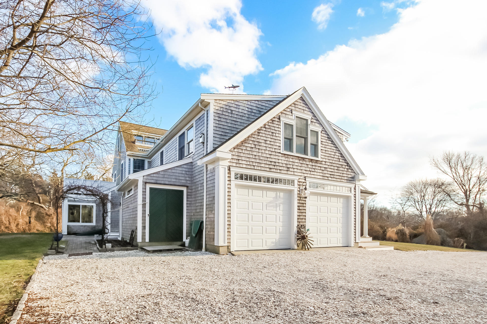 79 Stoney Point Road Cummaquid, MA 02675 - Photo 29 of 34 a view of a house with a yard