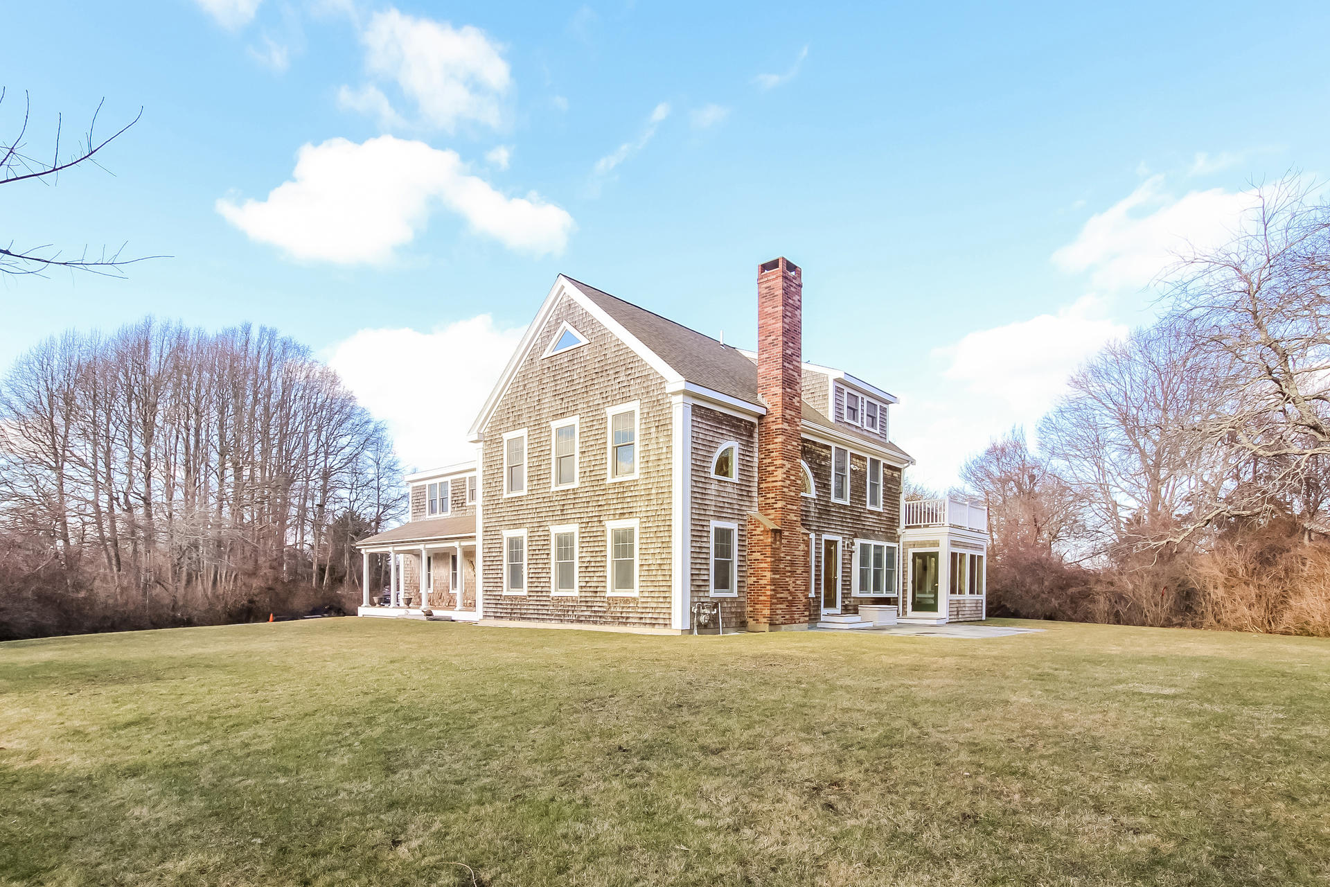 79 Stoney Point Road Cummaquid, MA 02675 - Photo 30 of 34 a view of a house with a yard