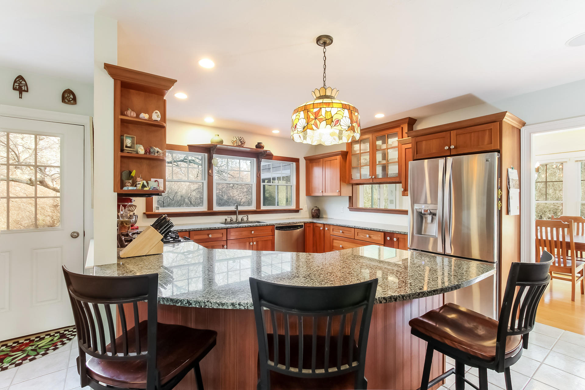 79 Stoney Point Road Cummaquid, MA 02675 - Photo 8 of 34 a view of a dining room with furniture wooden floor and chandelier