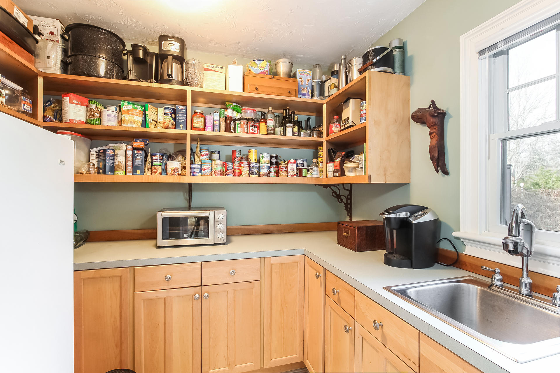 79 Stoney Point Road Cummaquid, MA 02675 - Photo 10 of 34 a kitchen with cabinets