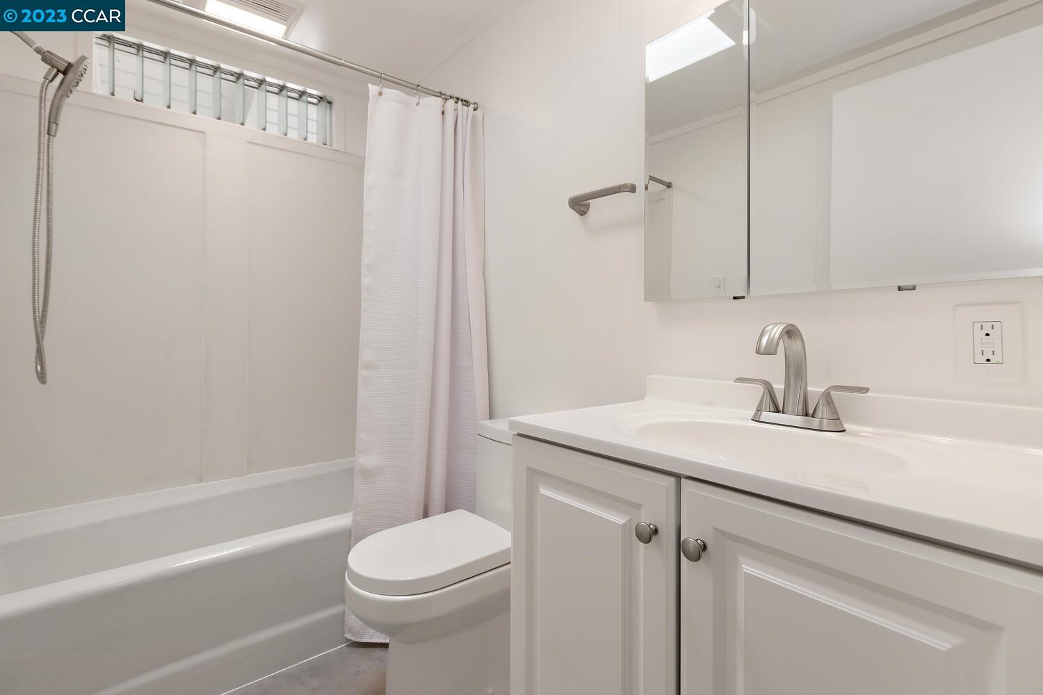 3374 Mildred Lane Lafayette, CA 94549 - Photo 27 of 34 a bathroom with a sink a toilet and shower