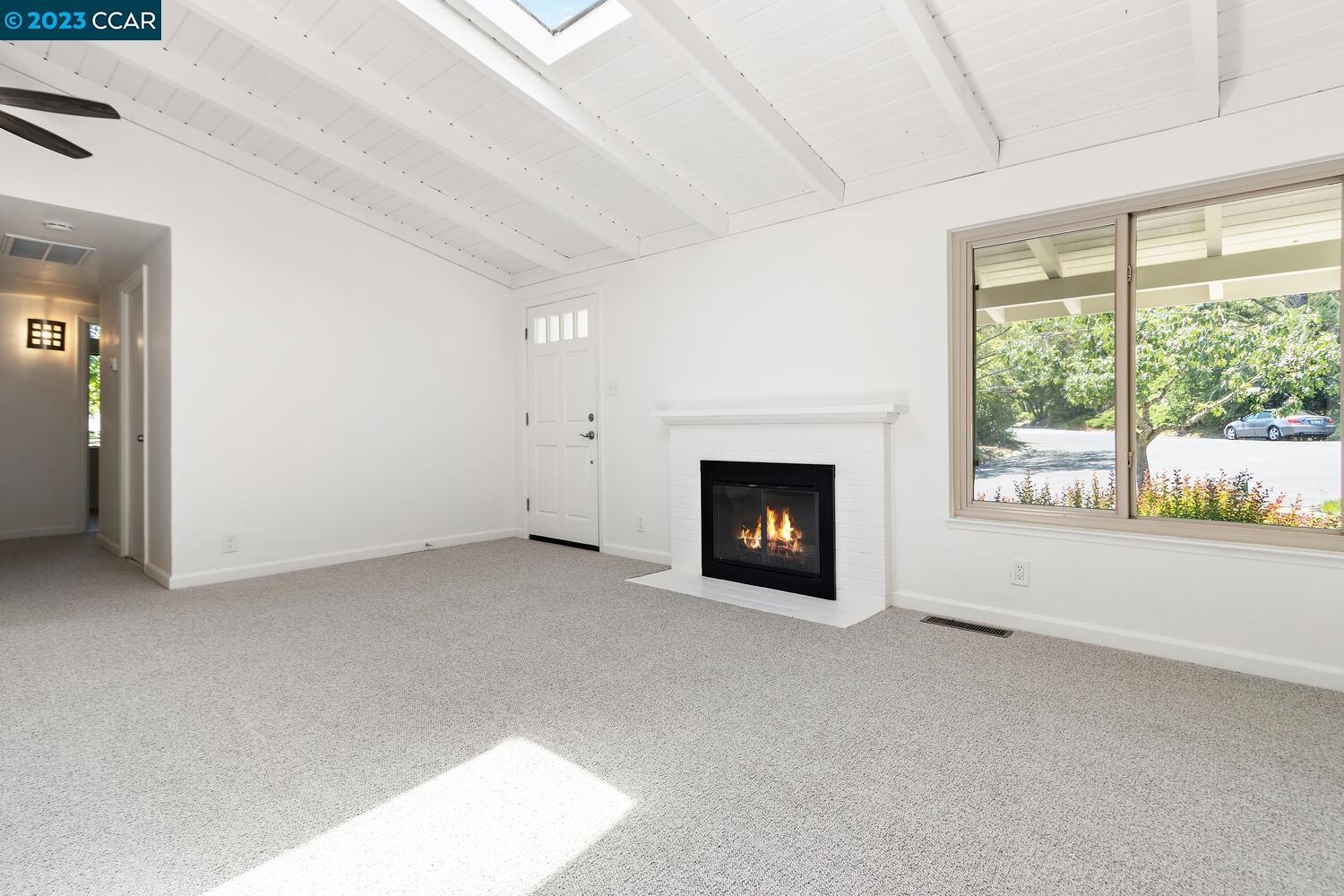 3374 Mildred Lane Lafayette, CA 94549 - Photo 6 of 34 a view of empty room with a fireplace