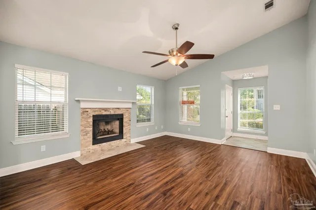 a kitchen with stainless steel appliances granite countertop a stove and a sink