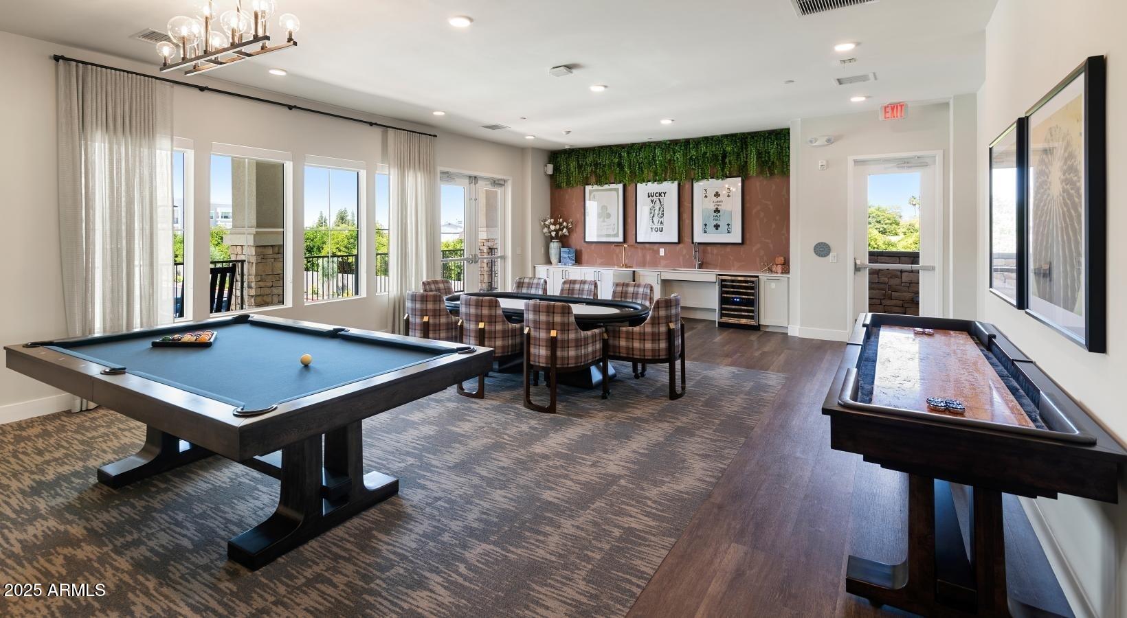 4755 East Southern Avenue, Unit A4 Mesa, AZ 85206 - Photo 15 of 19 a living room with furniture pool table and a large window