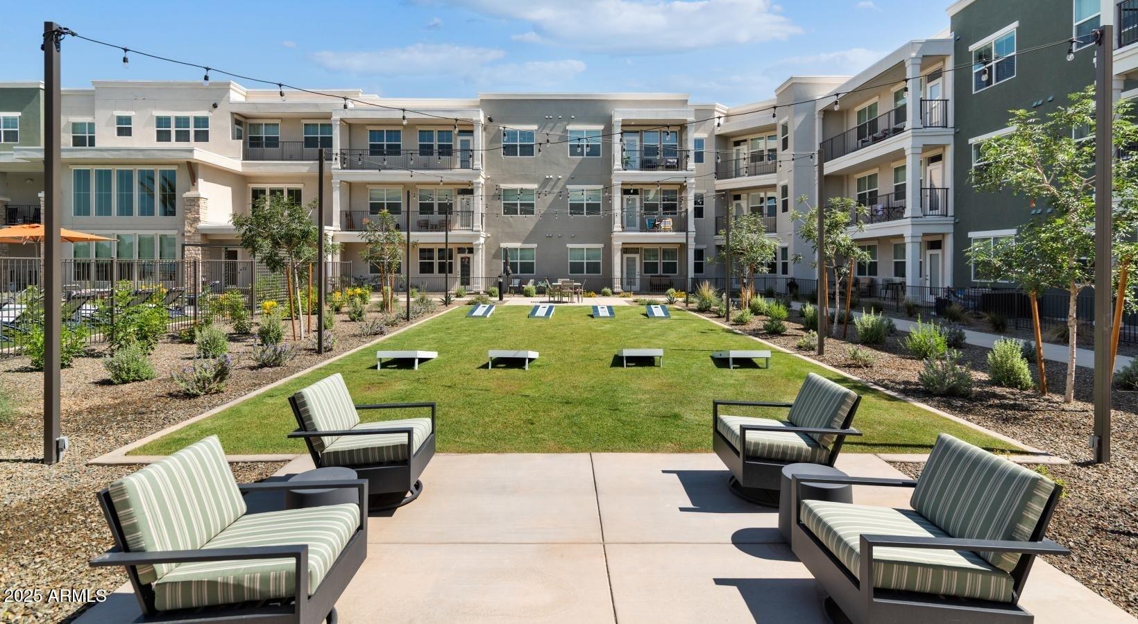 4755 East Southern Avenue, Unit A4 Mesa, AZ 85206 - Photo 19 of 19 a view of pool with outdoor seating