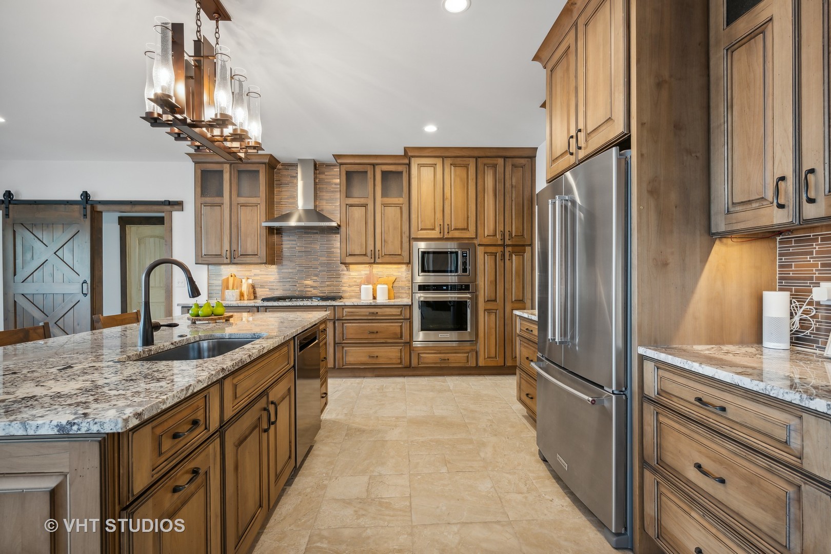 790 Robertson Road South Elgin, IL 60177 - Photo 8 of 31 a kitchen with stainless steel appliances granite countertop a sink refrigerator and cabinets