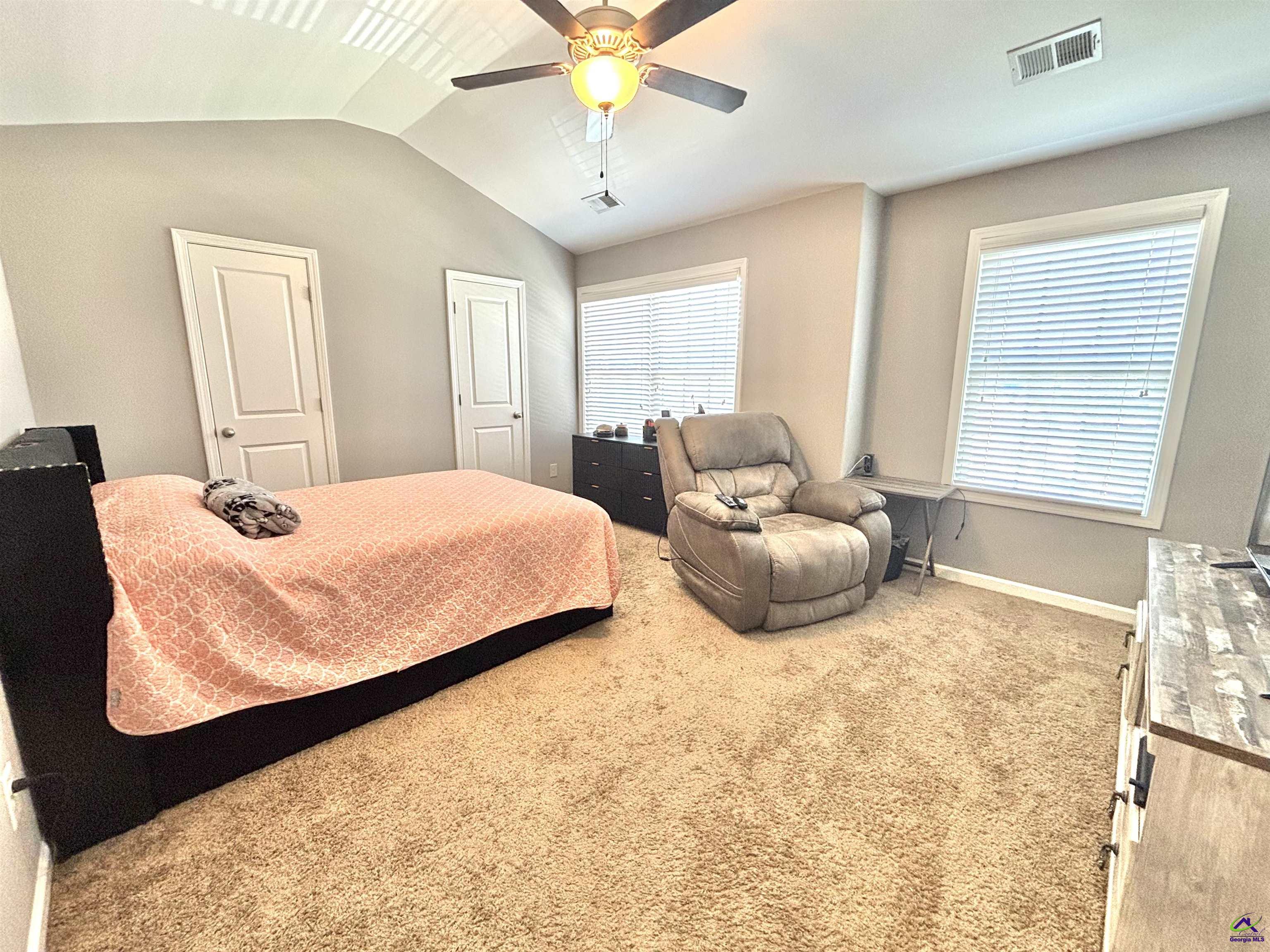 600 Post Oak Way Warner Robins, GA 31088 - Photo 40 of 50 a bedroom with a bed and window